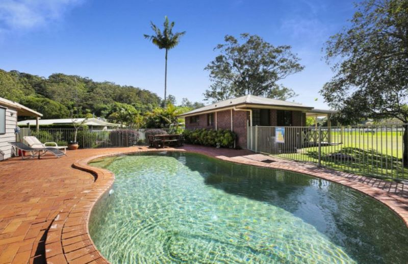 Five-bedroom home has a price guide in excess of $1,750,000. (PRD Real Estate Burleigh Heads)